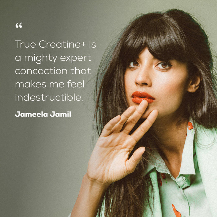 A quote graphic featuring the text 'True Creatine+ is a mighty expert concoction that makes me feel indestructible. Jameela Jamil' with dark hair, bangs, and red lipstick looking thoughtfully to the side.