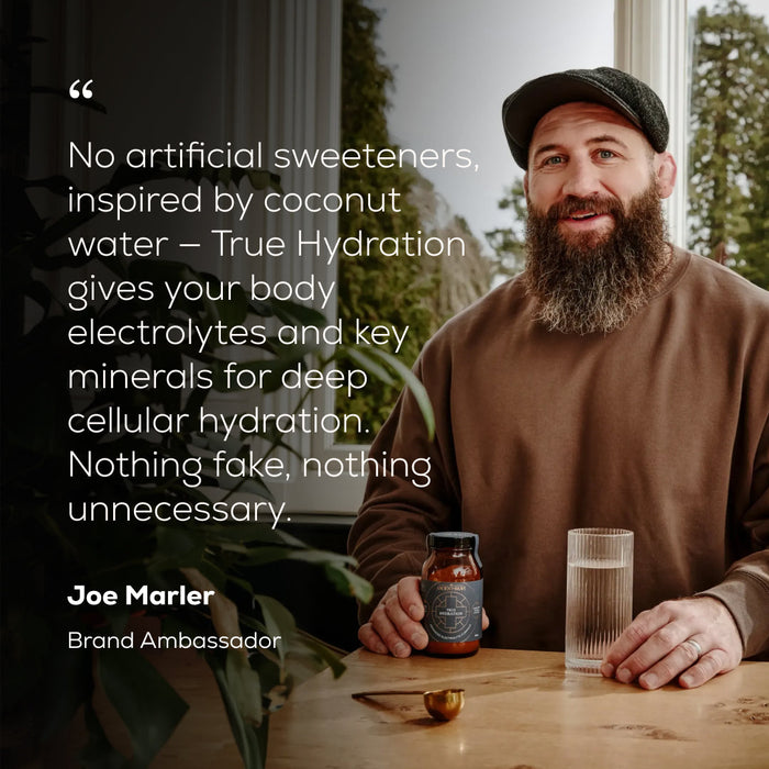 Joe Marler holding a jar of True Hydration and glass, with text about it giving your body electrolytes and key minerals.