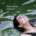 Woman floating in water with text: 'Deep cellular hydration'