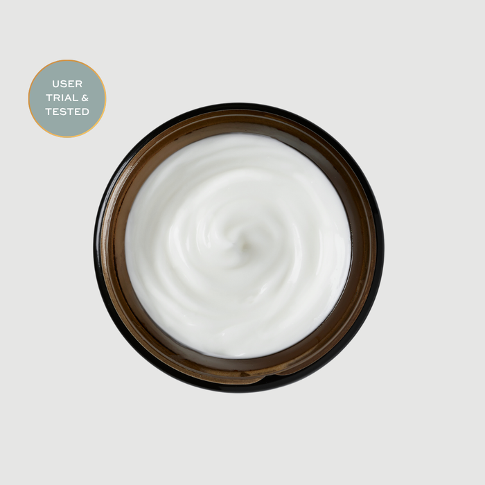 Jar of Maydi+ hydrating treatment mask white cream with a brown lid on a light grey background
